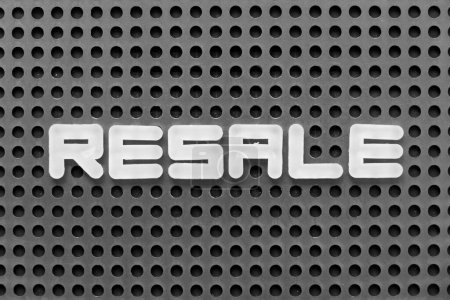 Photo for White alphabet letter in word resale on black pegboard background - Royalty Free Image
