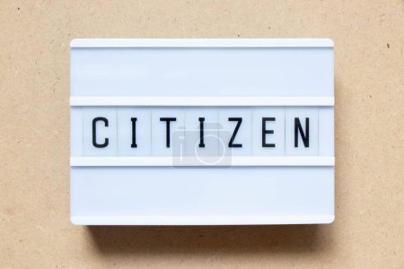 Photo for Lightbox with word citizen on wood background - Royalty Free Image