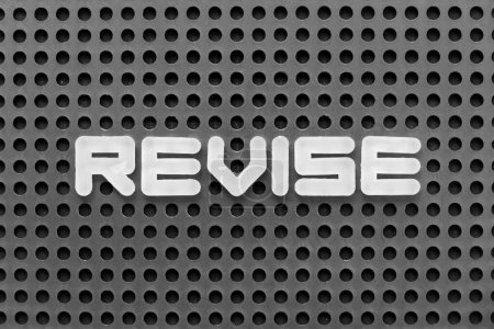 Photo for White alphabet letter in word revise on black pegboard background - Royalty Free Image