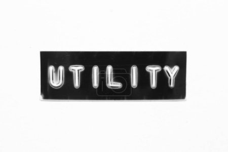 Photo for Black color banner that have embossed letter with word utility on white paper background - Royalty Free Image