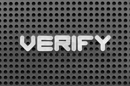 Photo for White alphabet letter in word verify on black pegboard background - Royalty Free Image