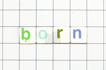 Photo for Colorful tile letter in word born on white grid background - Royalty Free Image