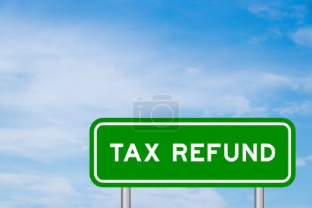 Green color transportation sign with word tax refund on blue sky with white cloud background