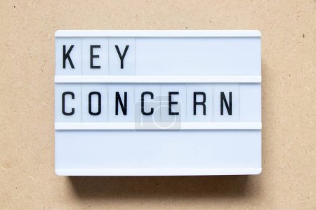 Photo for Lightbox with word key concern on wood background - Royalty Free Image