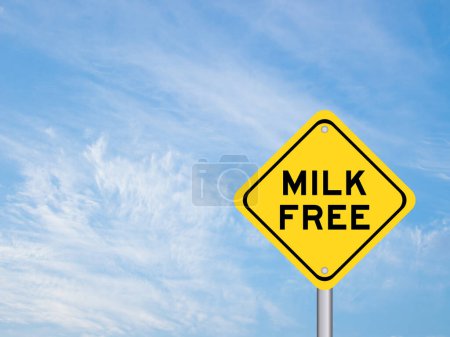 Yellow transportation sign with word milk free on blue color sky background
