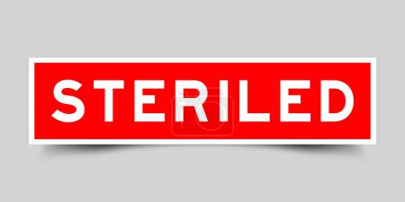 Illustration for Red color square shape sticker label with word steriled on gray background - Royalty Free Image