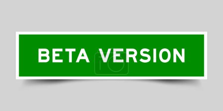 Square sticker label with word beta version in green color on gray background