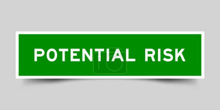Sticker label with word potential risk in green color on gray background