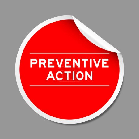 Red color peel sticker label with word preventive action on gray background
