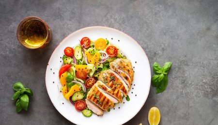 Photo for Fulfill Your Cravings with Keto-Friendly Chicken Fillet and Fresh Greens - Royalty Free Image