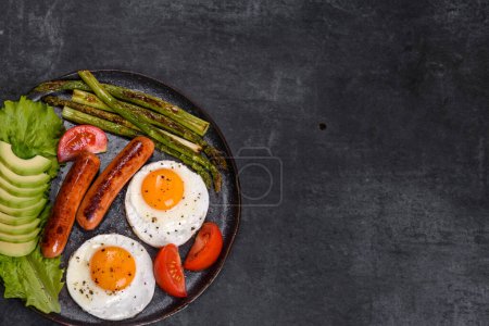 Photo for Egg and Sausage Feast: Hearty Breakfast Bliss - Royalty Free Image