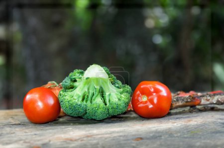 Photo for A vibrant mix of broccoli and tomatoes, perfect for healthconscious dishes - Royalty Free Image