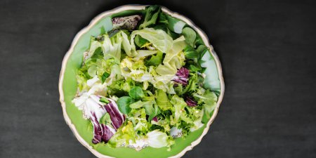 Photo for Burst of flavors in a fresh veggie salad - Royalty Free Image