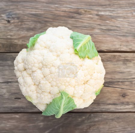 Photo for Ripe white cauliflower with green leaves Healthy organic vegetable on white background - Royalty Free Image