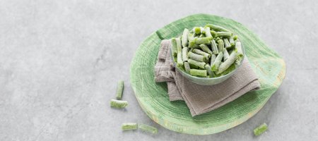Photo for Frozen green string beans in a bowl Convenient frozen vegetables for quick meals - Royalty Free Image