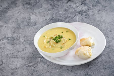 Photo for Creamy lemon chicken soup for a tangy and comforting meal - Royalty Free Image