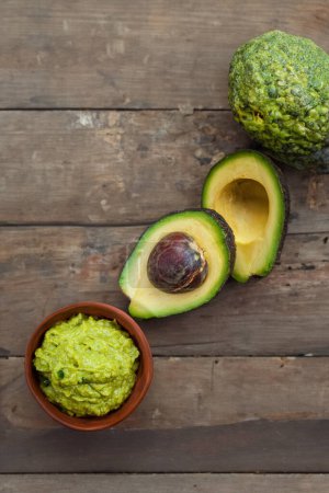 Photo for A bowl of creamy guacamole made from ripe avocados - Royalty Free Image