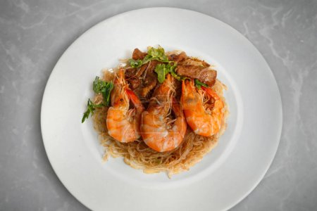 Photo for Delicate steamed glass noodles topped with succulent shrimp - Royalty Free Image