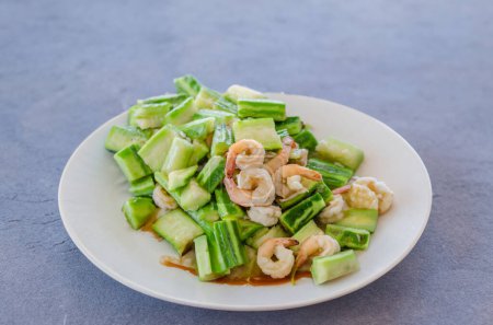 Photo for Zucchini and shrimp sizzling in a stir-fry - Royalty Free Image