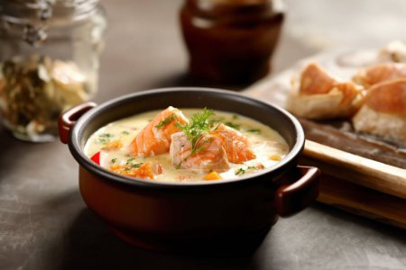 Photo for Creamy fish soup showcased in mouthwatering food photography. - Royalty Free Image