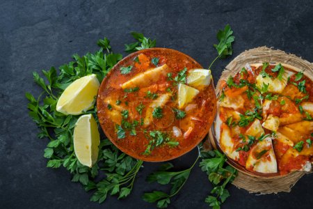 Photo for Psarosoupa traditional greek fish and vegetable soup - Royalty Free Image