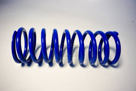 Photo for Blue off-road suspension springs on a white background. High quality photo - Royalty Free Image