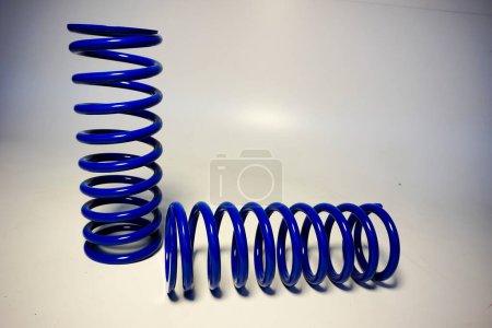Photo for Blue off-road suspension springs on a white background. High quality photo - Royalty Free Image