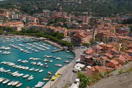 Foto de Port of Lerici in Liguria with moored boats panoramic view in sunny day. High quality photo - Imagen libre de derechos