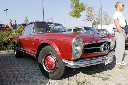 Photo for Bibbiano-Reggio Emilia Italy - 07 15 2015 : Free rally of vintage cars in the town square 1968 Pagoda Mercedes Benz 280SL. High quality photo - Royalty Free Image