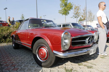 Photo for Bibbiano-Reggio Emilia Italy - 07 15 2015 : Free rally of vintage cars in the town square 1968 Pagoda Mercedes Benz 280SL. High quality photo - Royalty Free Image