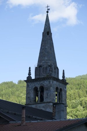 Foto de Ancient stone bell tower on the alps in bardonecchia italy. High quality photo - Imagen libre de derechos