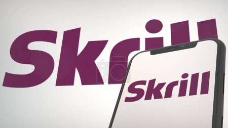 Foto de Logotipo de la aplicación Skrill en la pantalla de visualización móvil y fondo editorial - Imagen libre de derechos