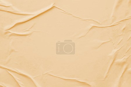 Photo for Texture of a yellow paper as a background or wallpaper - Royalty Free Image