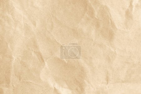 Wrinkled yellow paper as a background or wallpaper