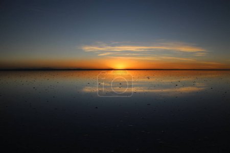Photo for Sunset over Uyuni salt lake in Bolivia - Royalty Free Image