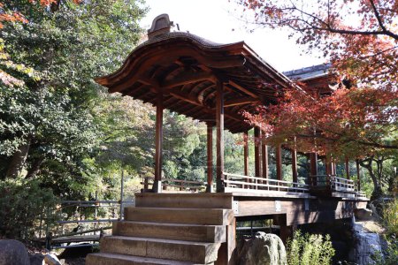 Photo for Kaitourou (roofed corridor) and autumn leaves in Shosei-en Garden, Kyoto, Japan - Royalty Free Image