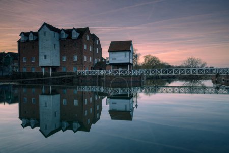 Photo for Abbey Mill and Weir, Tewkesbury at sunrise - Royalty Free Image