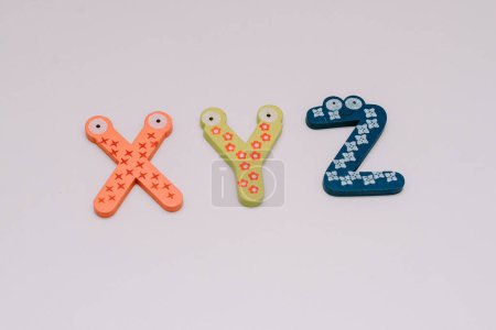 Letters X,Y,Z for children in a cute typeface placed on a white base