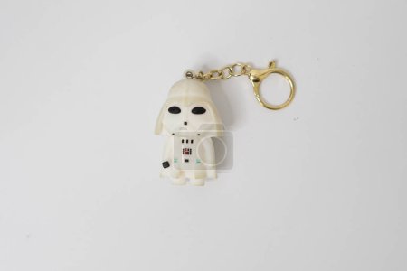 Photo for Veder dart display toy intended as a key chain with a white body - Royalty Free Image