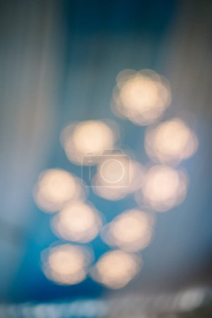 Intentionally blurred photo of decorative lights, adding ambiance and visual interest to designs, perfect for artistic and creative projects