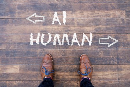 Téléchargez les photos : Homme regardant vers le bas les mots intelligence artificielle - IA - et humain crayonné sur le sol - en image libre de droit
