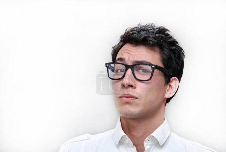 Guy with nerd glasses in front of a white background