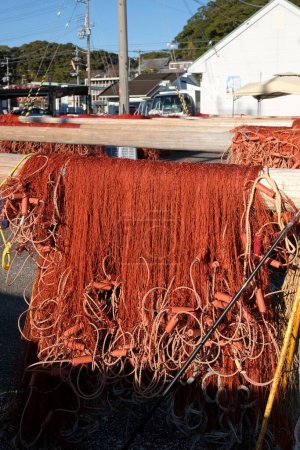 Photo for Fishing nets hung up to dry at the harbor of Kii-Katsuura, Japan - Royalty Free Image