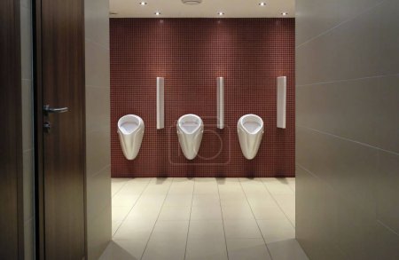 Photo for Urinals in a men's restroom - Royalty Free Image