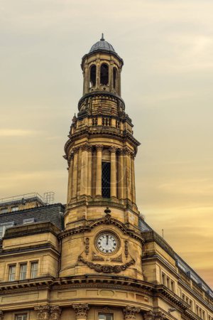 Royal Exchange Building Clock Tower in Manchester, UK.