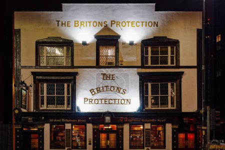 Photo for Manchester, UK - February 20 2020: The Britons Protection traditional English Ale and Whiskey pub facade. - Royalty Free Image