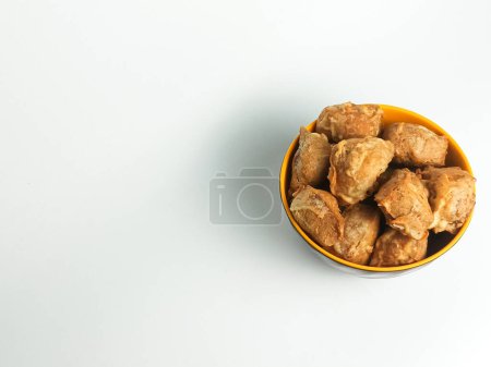 Photo for Top view of Tahu Isi or Tahu Goreng Tepung or Deep Fried Stuffed Tofu with advertisement copy space. Popular traditional snacks in Indonesia. Advertising concept with copy space. - Royalty Free Image