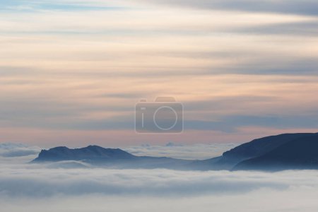 Beautiful minimalist sunrise landscape with the Safor mountains from the Alt de les Pedreres in Alcoy, Spain