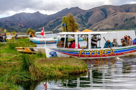 Photo for June, 2015 - Peru: Tourists boast at Paca Lagoon lake - Royalty Free Image