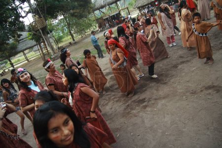 Photo for July 03, 2015 - Chanchamayo, Peru: women and men dancing in the Peruvian jungle - Royalty Free Image